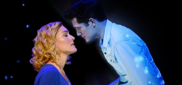Molly and Sam share a kiss in Ghost - the Musical