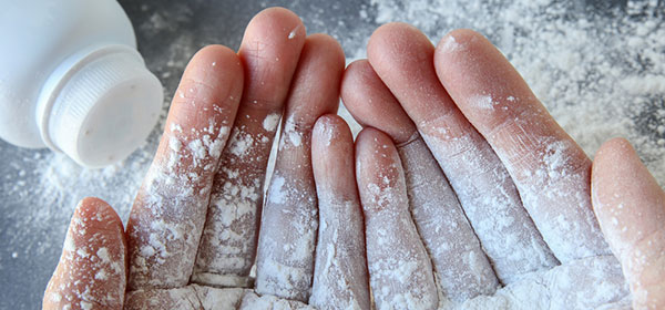 hands covered in talcum powder