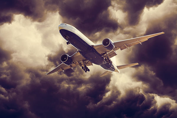 plane flying through dangerous weather