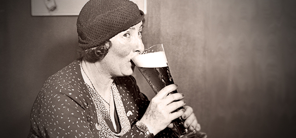 vintage photo of woman drinking beer